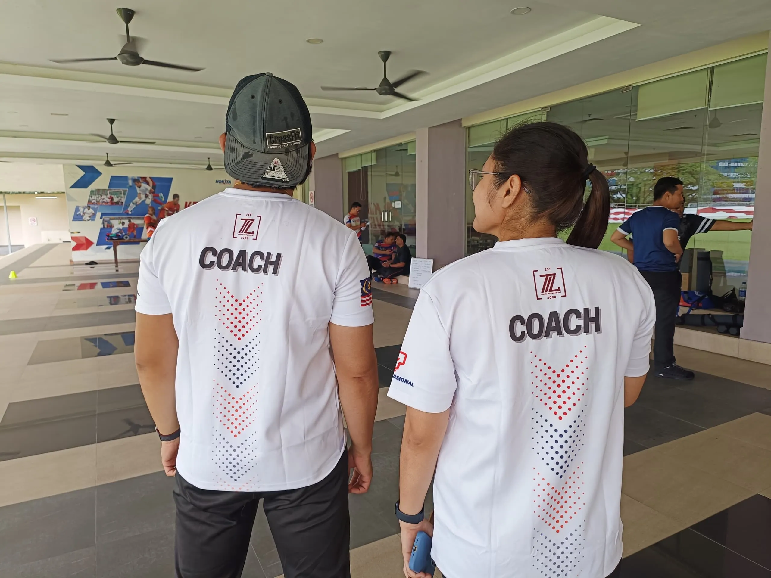 Coaches leading a corporate team building session